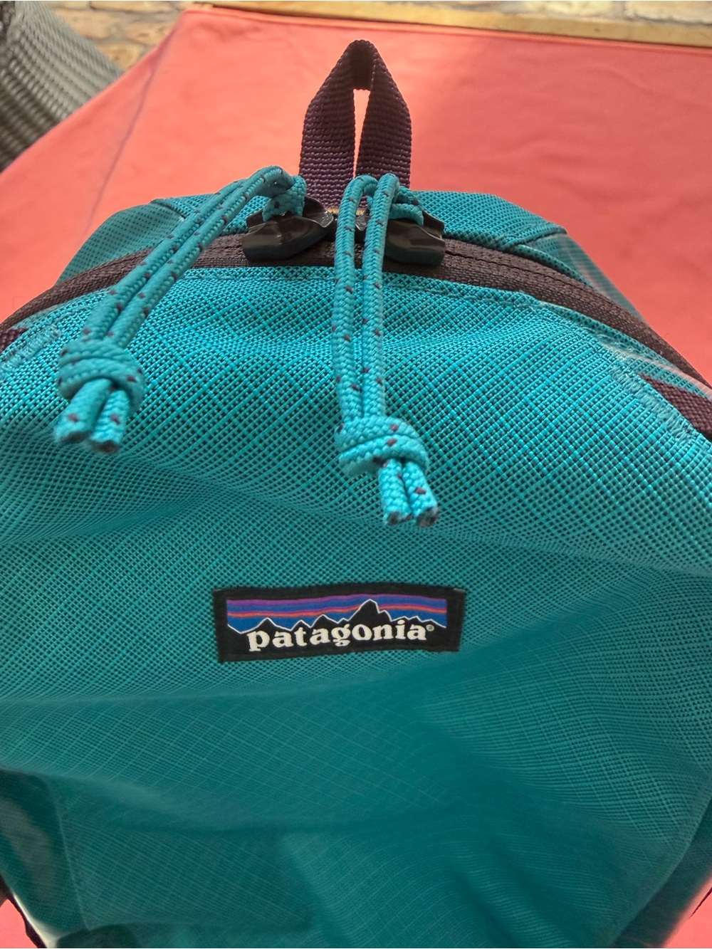 Patagonia Black Hole Cube 6L Teal with Purple, Orange, & Yellow Accents. - Picture 4 of 14